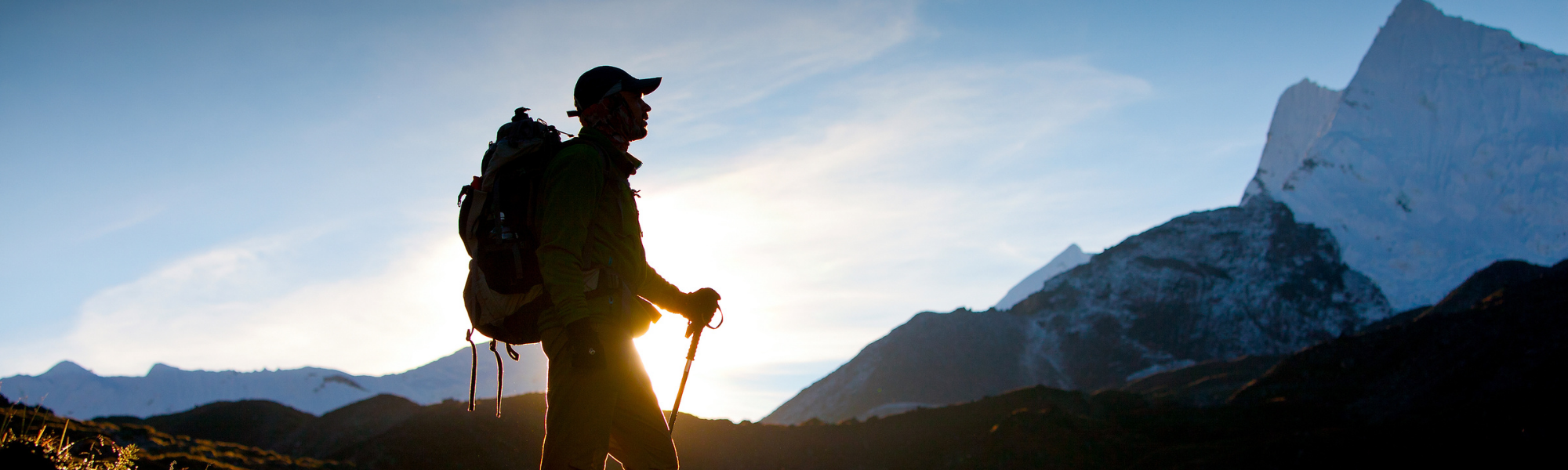 man hiking on a trail